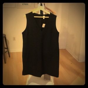 Wardrobe staple: Black, pocketed v-neck shift.